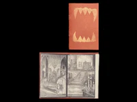 a book with a drawing of a monster with teeth