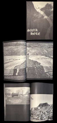 a black and white photograph of a mountain