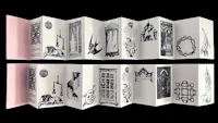 a book with black and white drawings on it
